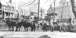 Six horse team and wagon at the scales on lower Main Street in Waterford VA
